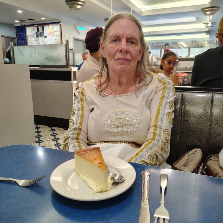 Suzanne with a Slice of NY Cheesecake at the Skylight Diner NYC