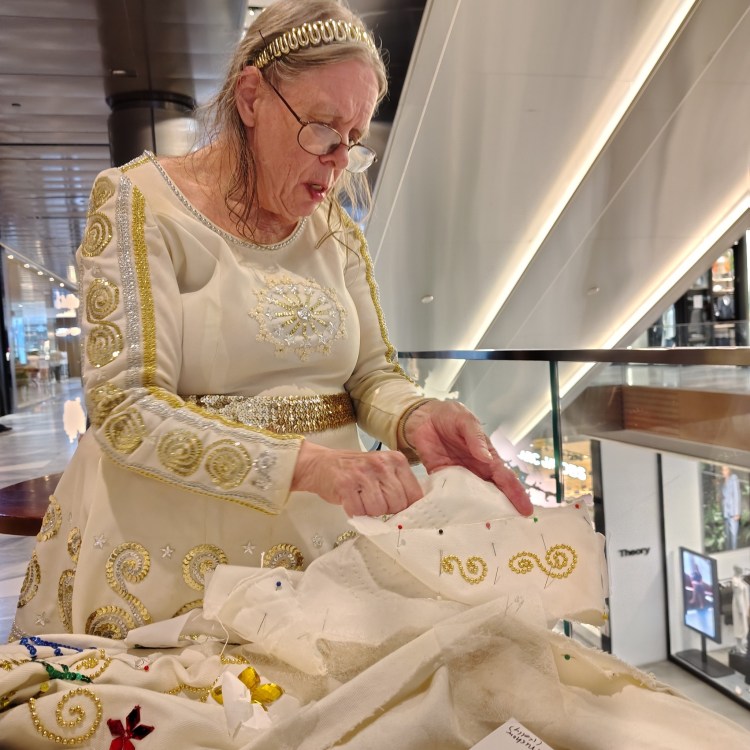 Suzanne Muldowney Sewing in a mall at Hudson Yards NYC